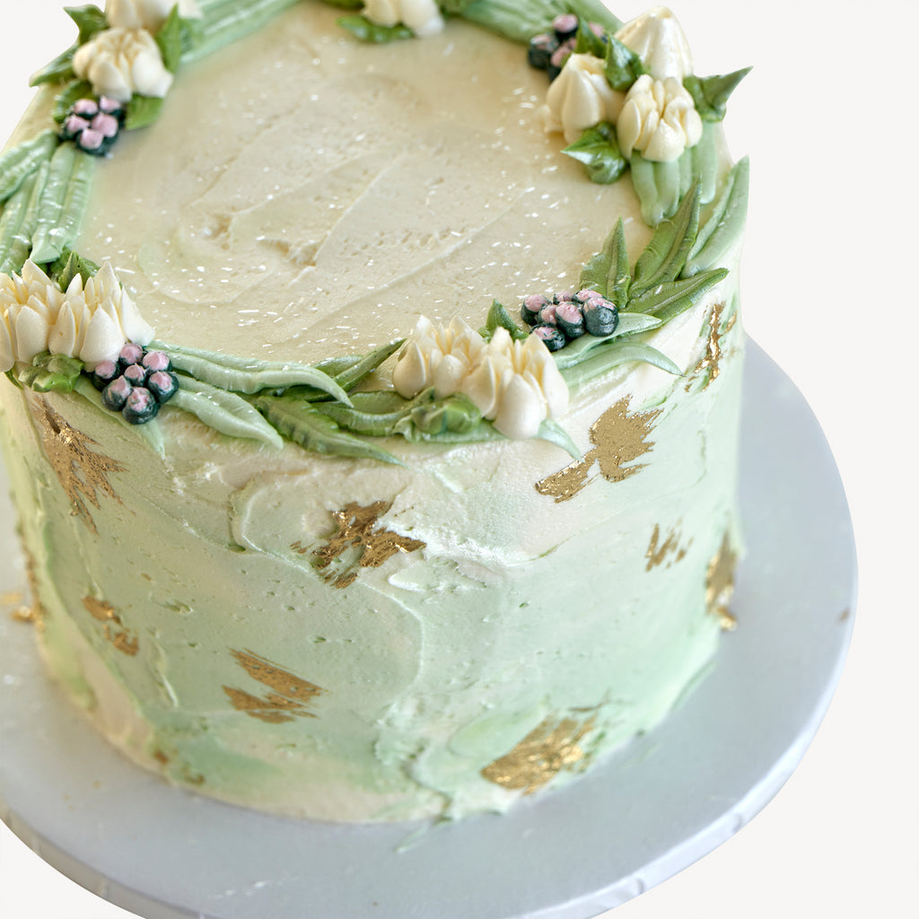 Textured buttercream with gold leaf wedding cake : r/Cakes